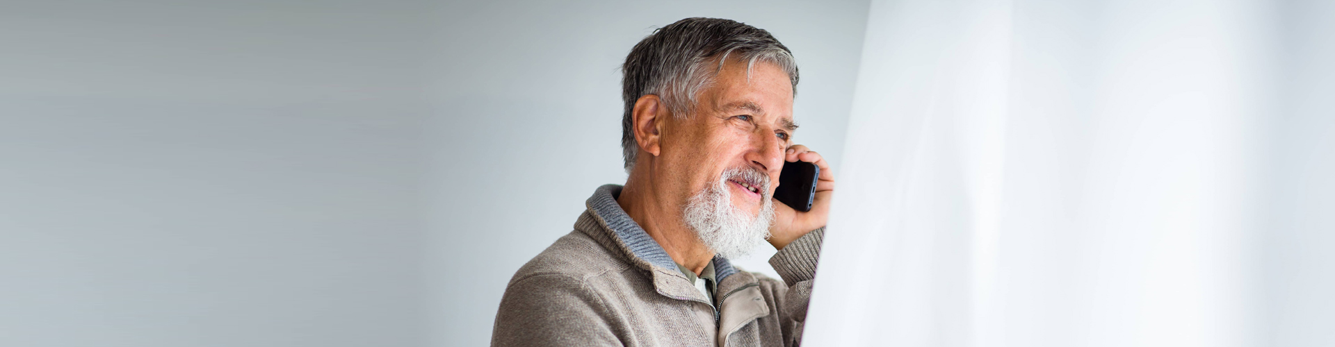 old man using cellphone